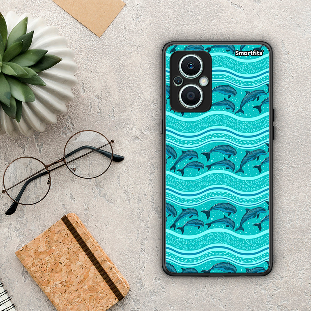 Θήκη Oppo Reno7 Lite Swimming Dolphins από τη Smartfits με σχέδιο στο πίσω μέρος και μαύρο περίβλημα | Oppo Reno7 Lite Swimming Dolphins Case with Colorful Back and Black Bezels