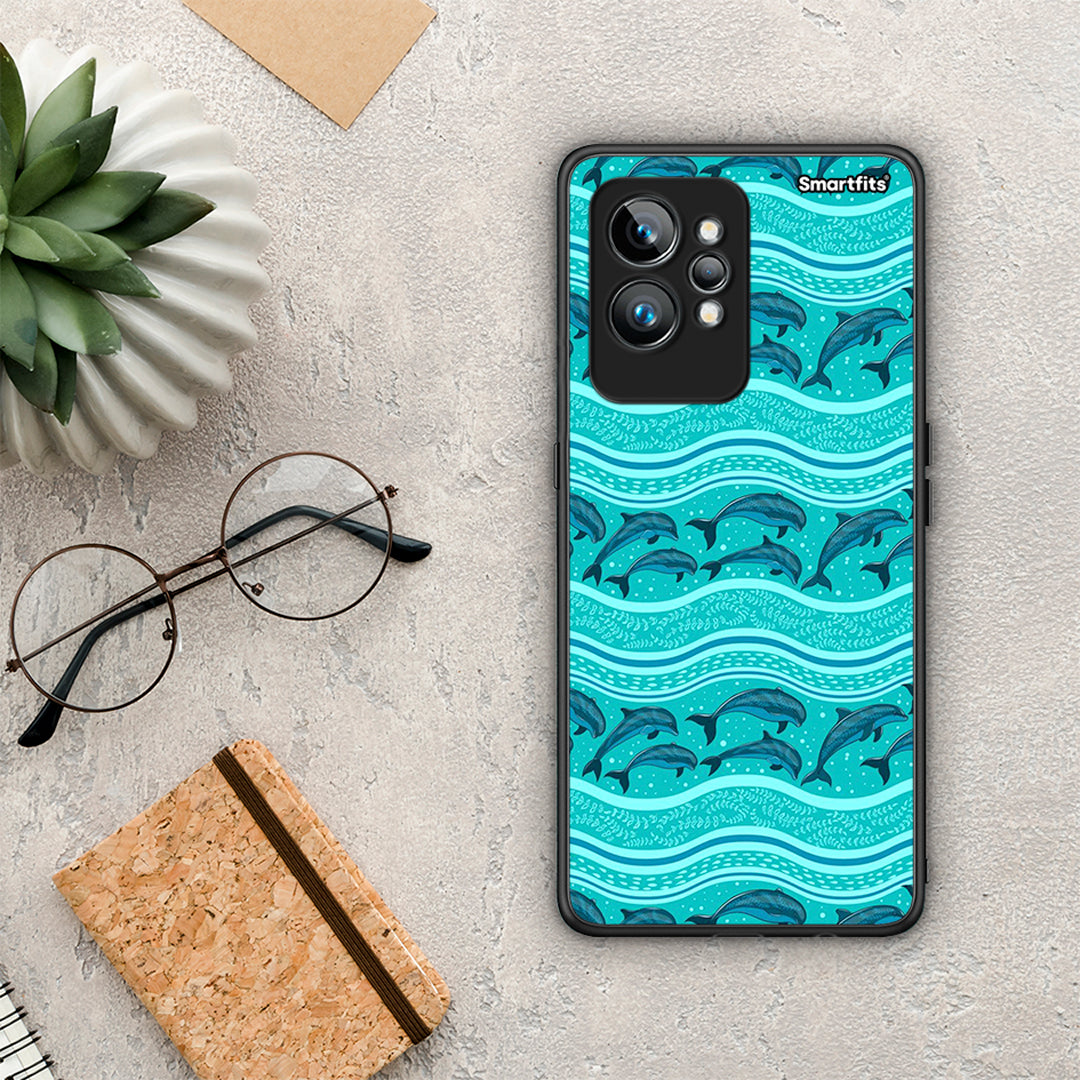 Θήκη Realme GT2 Swimming Dolphins από τη Smartfits με σχέδιο στο πίσω μέρος και μαύρο περίβλημα | Realme GT2 Swimming Dolphins Case with Colorful Back and Black Bezels