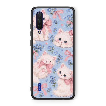 Θήκη Xiaomi Mi 9 Lite White Kittens and Blue Flowers Large από τη Smartfits με σχέδιο στο πίσω μέρος και μαύρο περίβλημα | Xiaomi Mi 9 Lite White Kittens and Blue Flowers Large case with colorful back and black bezels