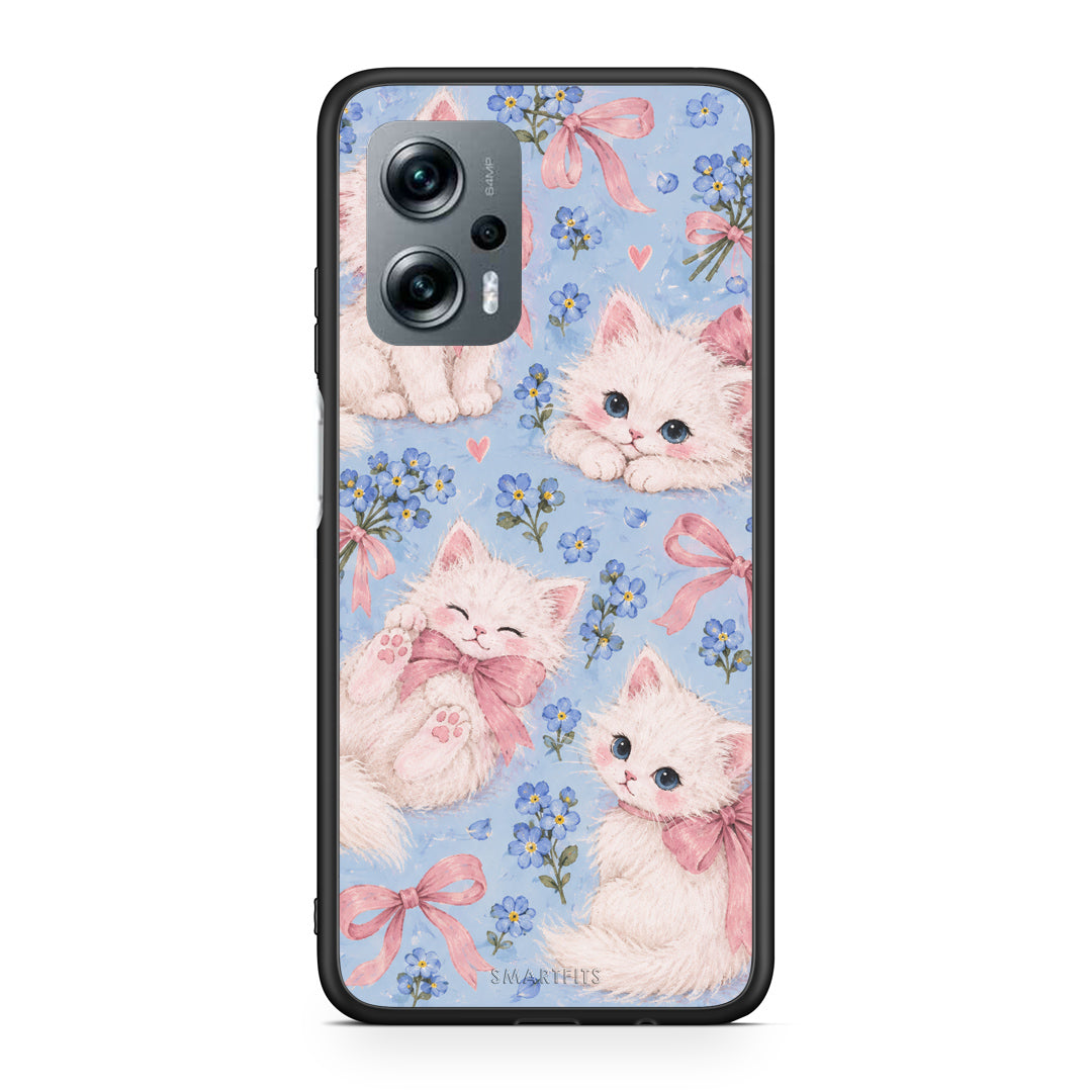 Θήκη Xiaomi Poco X4 GT White Kittens and Blue Flowers Large από τη Smartfits με σχέδιο στο πίσω μέρος και μαύρο περίβλημα | Xiaomi Poco X4 GT White Kittens and Blue Flowers Large case with colorful back and black bezels