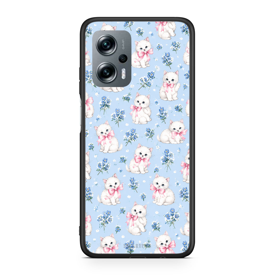 Θήκη Xiaomi Poco X4 GT White Kittens and Blue Flowers Small από τη Smartfits με σχέδιο στο πίσω μέρος και μαύρο περίβλημα | Xiaomi Poco X4 GT White Kittens and Blue Flowers Small case with colorful back and black bezels