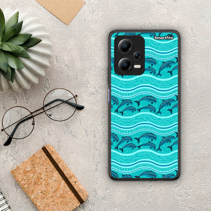 Θήκη Xiaomi Poco X5 5G Dual Swimming Dolphins από τη Smartfits με σχέδιο στο πίσω μέρος και μαύρο περίβλημα | Xiaomi Poco X5 5G Dual Swimming Dolphins Case with Colorful Back and Black Bezels