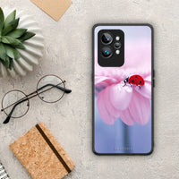 Thumbnail for Θήκη Realme GT2 Pro Ladybug Flower από τη Smartfits με σχέδιο στο πίσω μέρος και μαύρο περίβλημα | Realme GT2 Pro Ladybug Flower Case with Colorful Back and Black Bezels