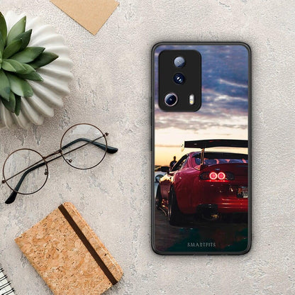 Θήκη Xiaomi 13 Lite 5G Racing Supra από τη Smartfits με σχέδιο στο πίσω μέρος και μαύρο περίβλημα | Xiaomi 13 Lite 5G Racing Supra Case with Colorful Back and Black Bezels