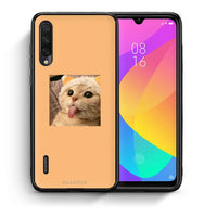 Thumbnail for Θήκη Xiaomi Mi A3 Cat Tongue από τη Smartfits με σχέδιο στο πίσω μέρος και μαύρο περίβλημα | Xiaomi Mi A3 Cat Tongue case with colorful back and black bezels